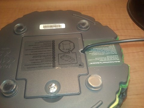 Reassembled with cable running through battery cover; rubber feet added